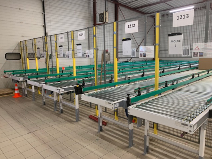 PALETTISEUR AVEC ROBOT FANUC ET FILMEUSE